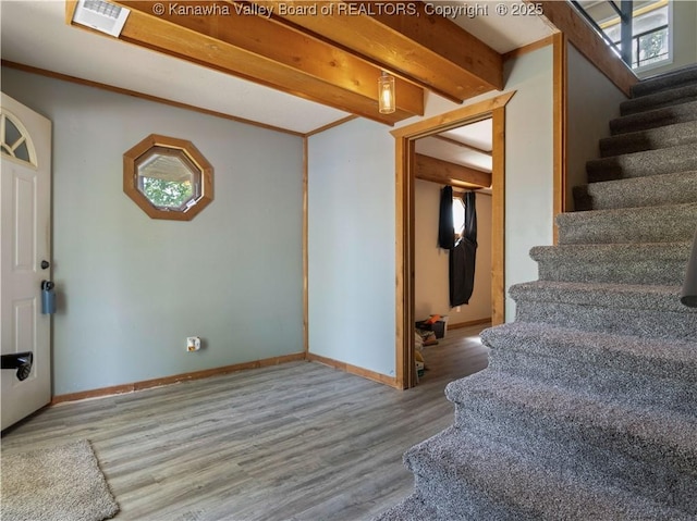 67 Poplar Dr, Scott Depot, WV 25560 - foyer entrance featuring stairs, wood finished floors, and baseboards