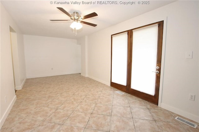 2111 21st St, Nitro, WV 25143 - spare room featuring a ceiling fan and baseboards