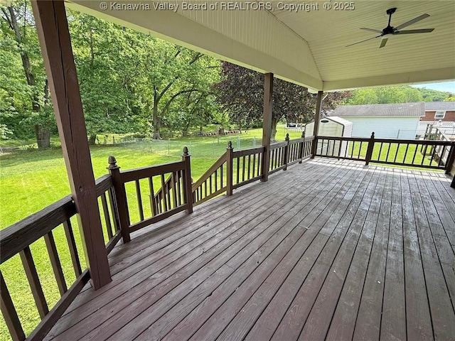 2111 21st St, Nitro, WV 25143 - wooden deck featuring ceiling fan and a yard