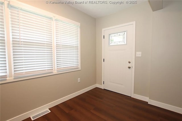 2111 21st St, Nitro, WV 25143 - entrance foyer featuring baseboards and dark wood-style flooring