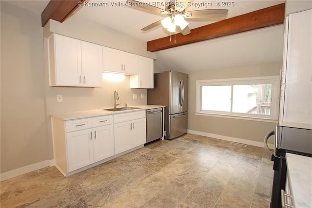 2111 21st St, Nitro, WV 25143 - kitchen featuring a sink, appliances with stainless steel finishes, a ceiling fan, light stone finish flooring, and light countertops