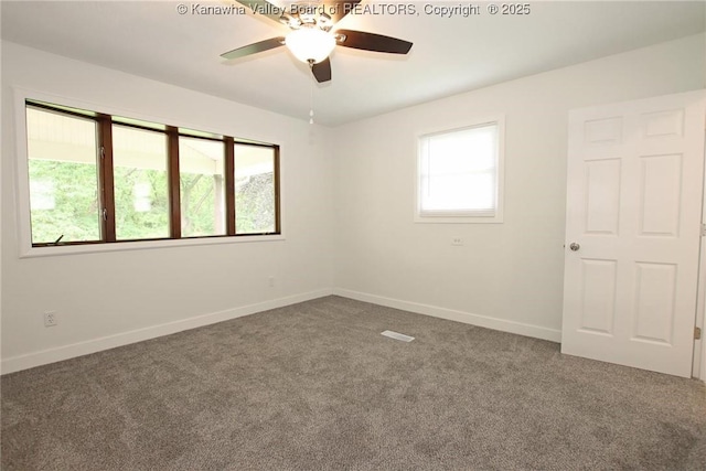 2111 21st St, Nitro, WV 25143 - carpeted spare room with a ceiling fan and baseboards