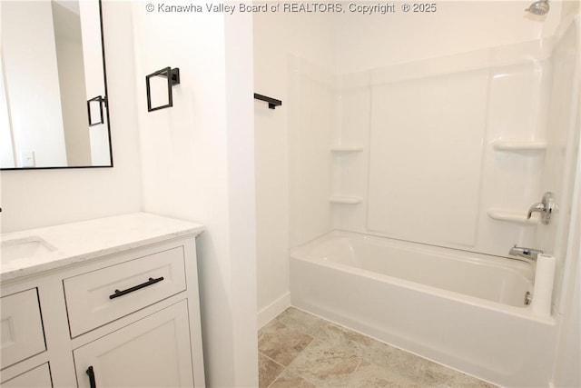 2111 21st St, Nitro, WV 25143 - full bathroom with vanity, baseboards, shower / washtub combination, and stone finish flooring