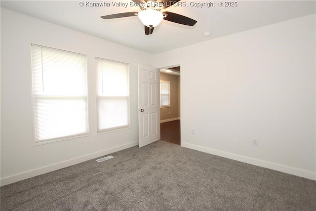 2111 21st St, Nitro, WV 25143 - unfurnished room with ceiling fan, carpet flooring, and baseboards