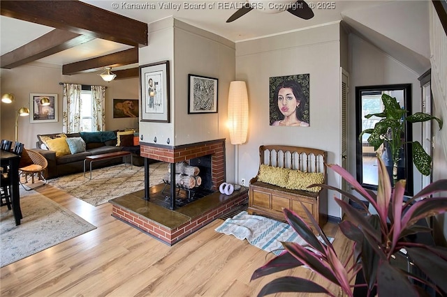 918 Greendale Dr, Charleston, WV 25302 - living area featuring wood finished floors, ceiling fan, and a brick fireplace