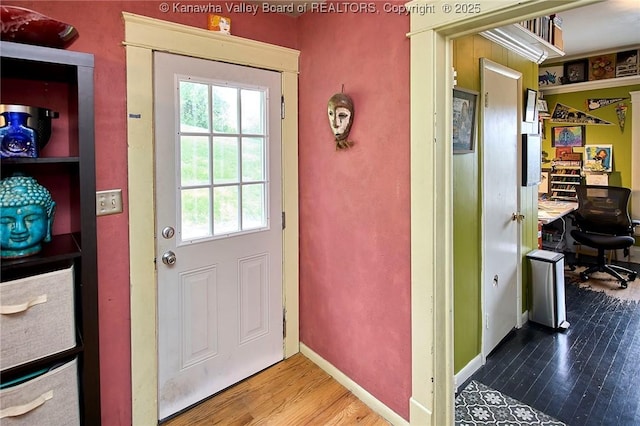 918 Greendale Dr, Charleston, WV 25302 - doorway to outside with wood finished floors, a desk, and baseboards