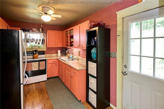 918 Greendale Dr, Charleston, WV 25302 - kitchen featuring freestanding refrigerator, range with electric stovetop, a sink, open shelves, and light countertops