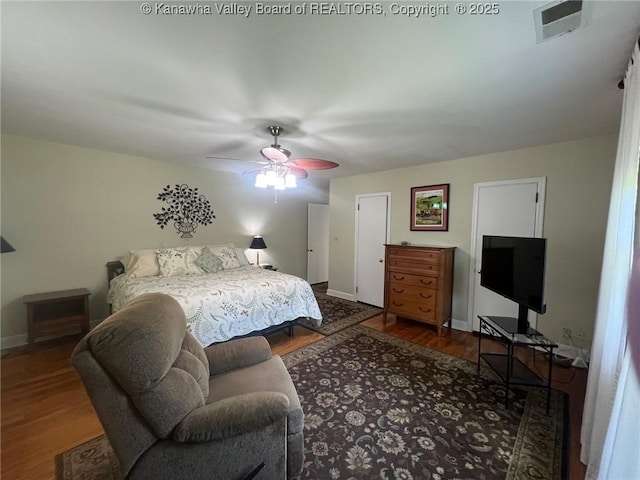 814 Skinner Dr, Saint Albans, WV 25177 - bedroom with wood finished floors, a ceiling fan, and baseboards