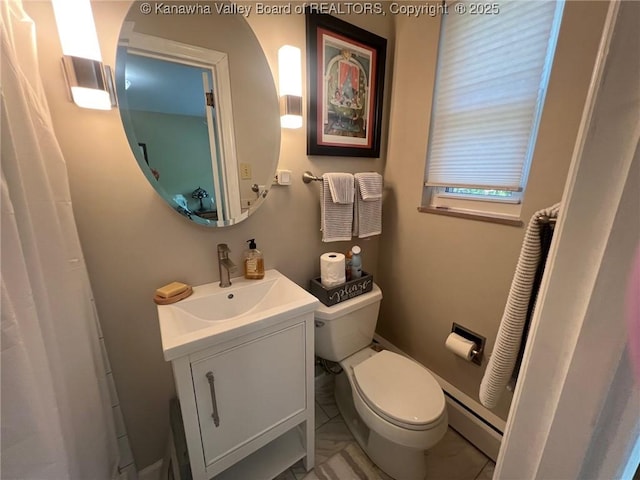 814 Skinner Dr, Saint Albans, WV 25177 - bathroom featuring baseboard heating, toilet, and vanity
