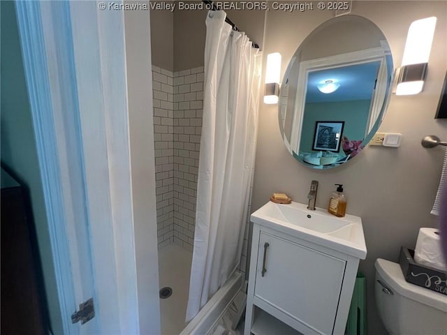 814 Skinner Dr, Saint Albans, WV 25177 - bathroom featuring toilet, vanity, and a tile shower
