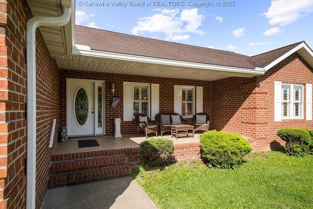 108 Lock Ln, Alum Creek, WV 25003 - entrance to property featuring a porch, brick siding, and roof with shingles
