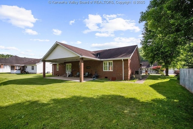 108 Lock Ln, Alum Creek, WV 25003 - rear view of house featuring brick siding and a patio