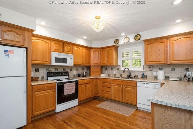 108 Lock Ln, Alum Creek, WV 25003 - kitchen with white appliances, a sink, light countertops, tasteful backsplash, and recessed lighting