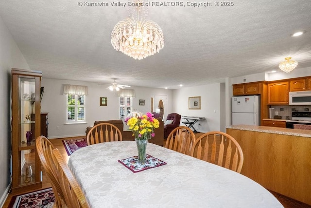 108 Lock Ln, Alum Creek, WV 25003 - dining area with a textured ceiling, a chandelier, wood finished floors, ceiling fan, and recessed lighting