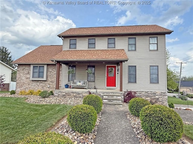 2 Valley View Ests, Hurricane, WV 25526 - view of front of home featuring a porch, a front yard, and roof with shingles