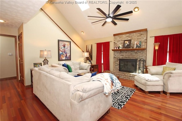 2 Valley View Ests, Hurricane, WV 25526 - living area with a ceiling fan, vaulted ceiling, wood finished floors, a fireplace, and baseboards