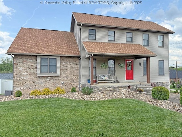 2 Valley View Ests, Hurricane, WV 25526 - view of front of home featuring covered porch, a front lawn, brick siding, and roof with shingles