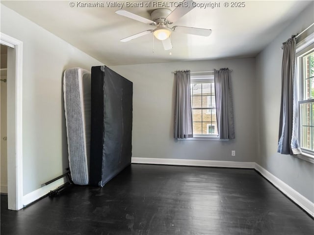 1300 Enslow Blvd, Huntington, WV 25701 - spare room featuring wood finished floors, baseboards, and ceiling fan