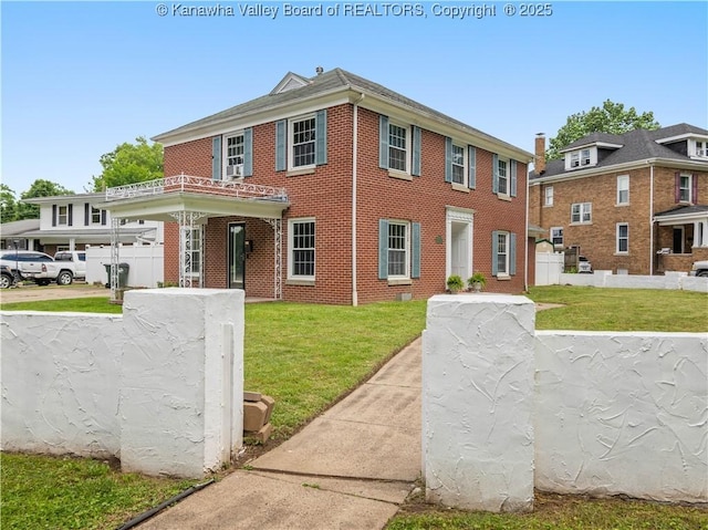1300 Enslow Blvd, Huntington, WV 25701 - view of front of home with brick siding and a front lawn