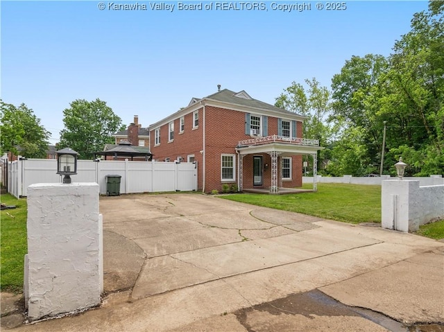 1300 Enslow Blvd, Huntington, WV 25701 - view of front facade featuring brick siding and covered porch