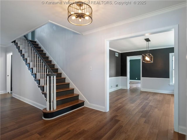 1300 Enslow Blvd, Huntington, WV 25701 - staircase featuring wood finished floors, ornamental molding, a chandelier, and baseboards