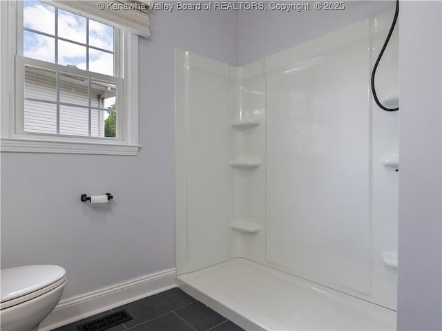 1300 Enslow Blvd, Huntington, WV 25701 - full bathroom featuring tile patterned flooring, baseboards, toilet, and a shower