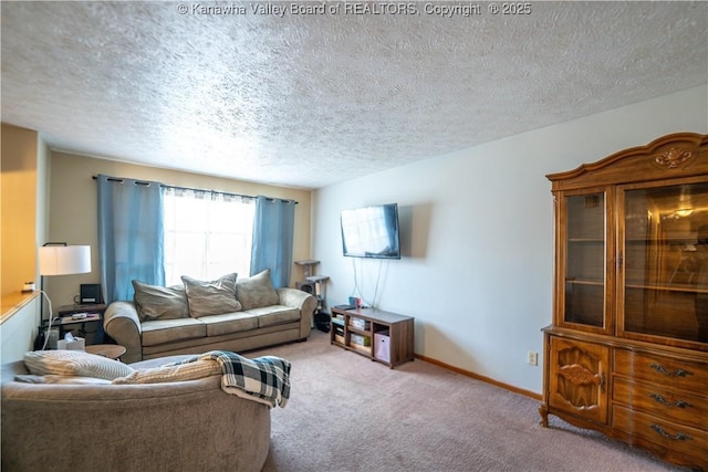 400 13th St, Dunbar, WV 25064 - living room featuring carpet, a textured ceiling, and baseboards