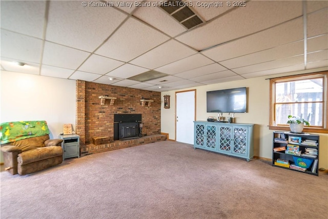 400 13th St, Dunbar, WV 25064 - carpeted living area with a paneled ceiling and a fireplace