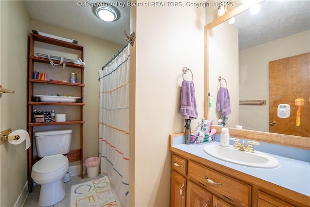 400 13th St, Dunbar, WV 25064 - bathroom with toilet, vanity, baseboards, a textured ceiling, and curtained shower