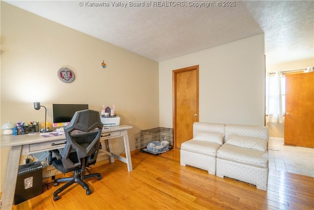 400 13th St, Dunbar, WV 25064 - office featuring wood finished floors, baseboards, and a textured ceiling
