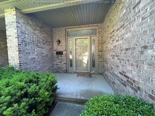 8 Dapplewood Rd, South Charleston, WV 25309 - view of exterior entry featuring brick siding
