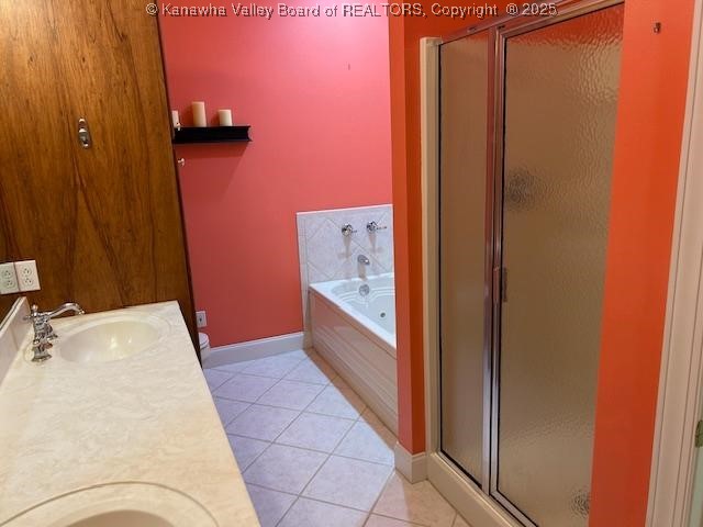 8 Dapplewood Rd, South Charleston, WV 25309 - full bath with a shower stall, a garden tub, double vanity, and tile patterned flooring