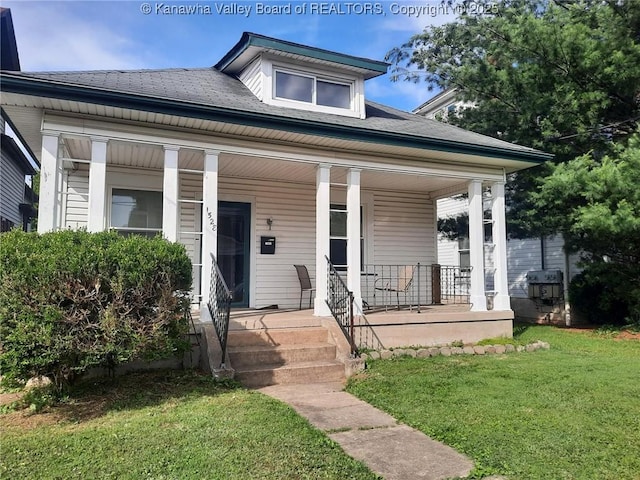 1528 Jackson St, Charleston, WV 25311 - bungalow featuring covered porch and a front yard