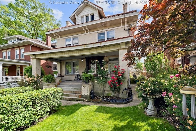 1565 Virginia St E, Charleston, WV 25311 - american foursquare style home featuring covered porch