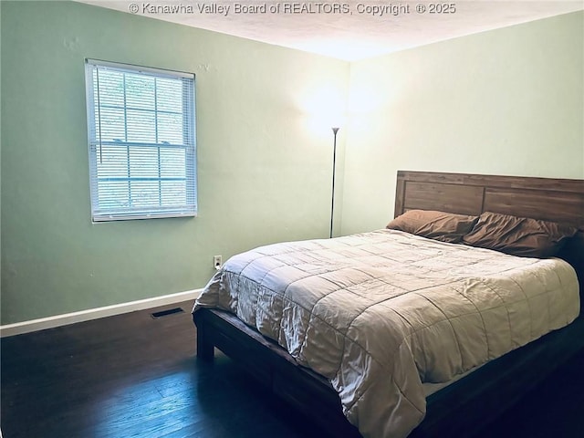 237 Pine Cir, Dunbar, WV 25064 - bedroom with wood finished floors and baseboards