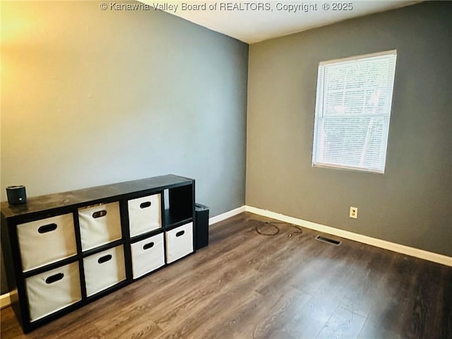237 Pine Cir, Dunbar, WV 25064 - empty room with baseboards and dark wood-style floors