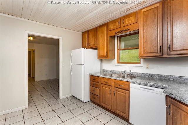4096 Indian Creek Rd, Elkview, WV 25071 - kitchen featuring white appliances, a sink, light tile patterned flooring, and brown cabinets