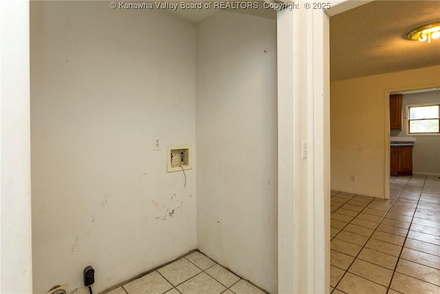 4096 Indian Creek Rd, Elkview, WV 25071 - laundry room with light tile patterned floors and hookup for a washing machine