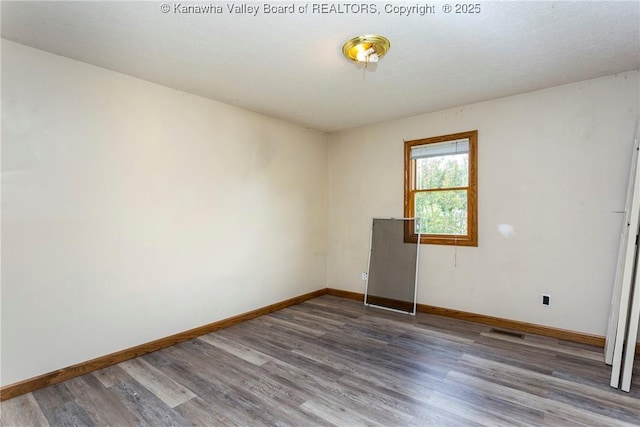 4096 Indian Creek Rd, Elkview, WV 25071 - spare room with wood finished floors and baseboards