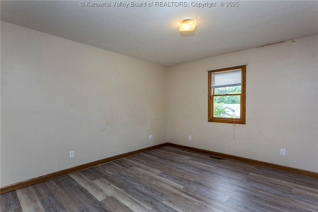4096 Indian Creek Rd, Elkview, WV 25071 - unfurnished room with wood finished floors and baseboards
