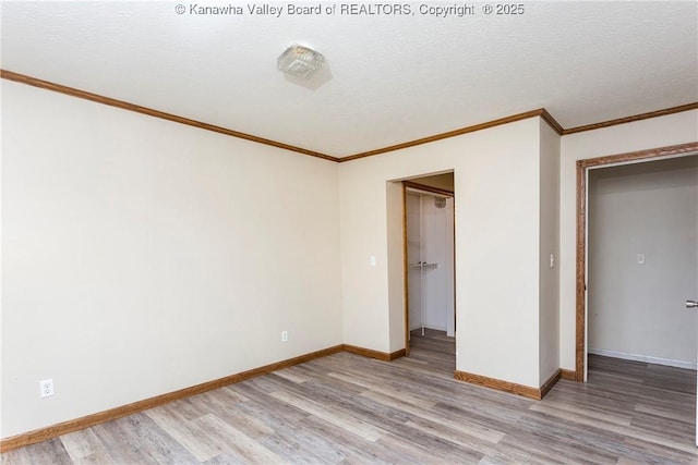 4096 Indian Creek Rd, Elkview, WV 25071 - unfurnished bedroom featuring light wood finished floors, ornamental molding, and baseboards