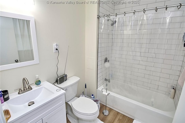 5201 Hammons Dr, Charleston, WV 25313 - full bath with toilet, vanity, shower / tub combination, and wood finished floors