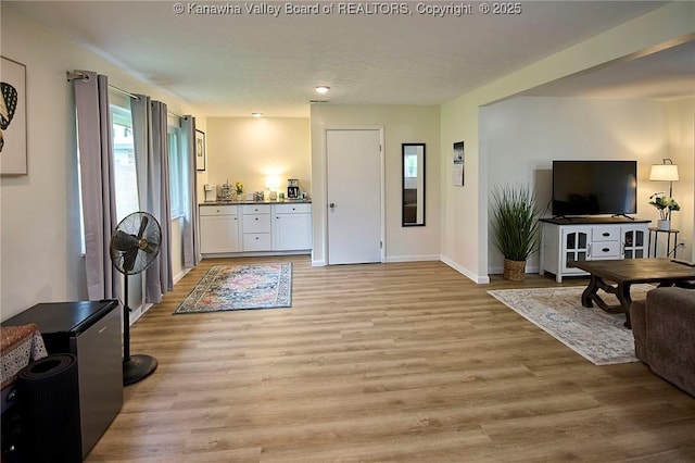 5201 Hammons Dr, Charleston, WV 25313 - foyer entrance with light wood-style floors and baseboards