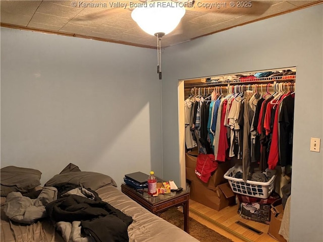 16298 Deepwater Mountain Rd, Wv, WV 25057 - bedroom with ornamental molding and a closet