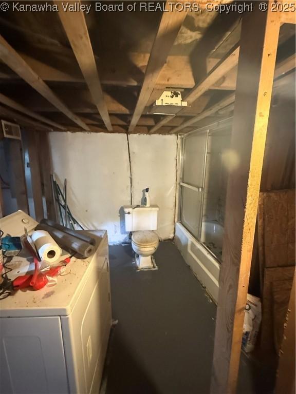 16298 Deepwater Mountain Rd, Wv, WV 25057 - unfinished below grade area featuring washer / clothes dryer