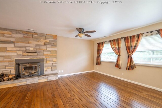 102 Utah Hollow Rd, Charleston, WV 25312 - unfurnished living room with ceiling fan, hardwood / wood-style floors, and baseboards
