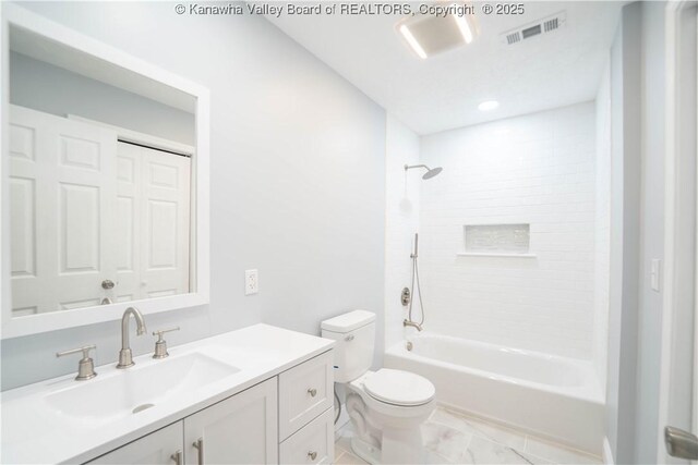 102 Utah Hollow Rd, Charleston, WV 25312 - bathroom featuring vanity, toilet, shower / washtub combination, and marble look tile flooring