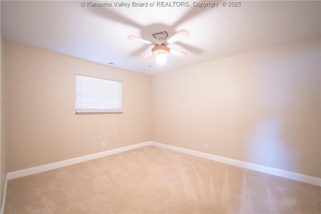 102 Utah Hollow Rd, Charleston, WV 25312 - empty room featuring a ceiling fan, baseboards, and light colored carpet
