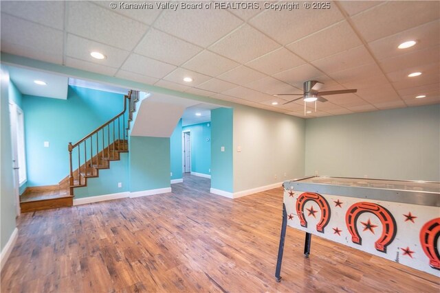 102 Utah Hollow Rd, Charleston, WV 25312 - playroom featuring wood finished floors, baseboards, recessed lighting, ceiling fan, and a drop ceiling
