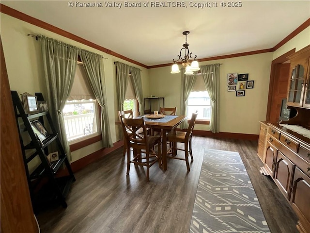 2169 N 21st St, Nitro, WV 25143 - dining room with a chandelier, baseboards, dark wood-style floors, and crown molding